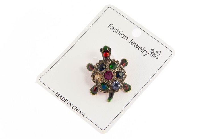 Elegancka broszka żółw