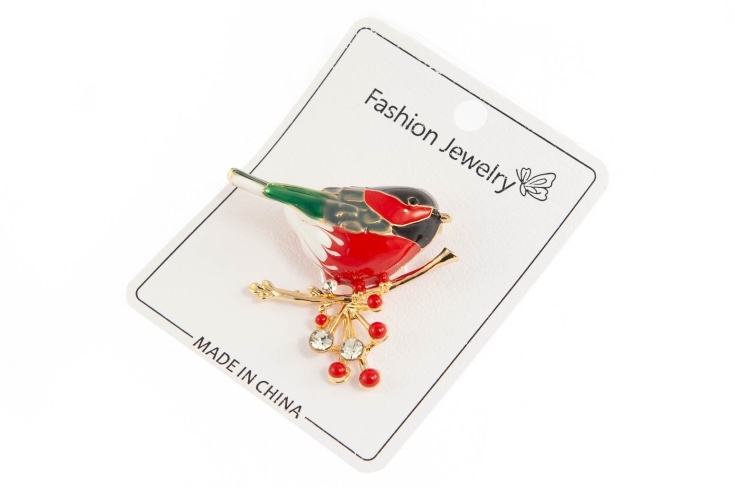 Elegancka broszka ptaszek